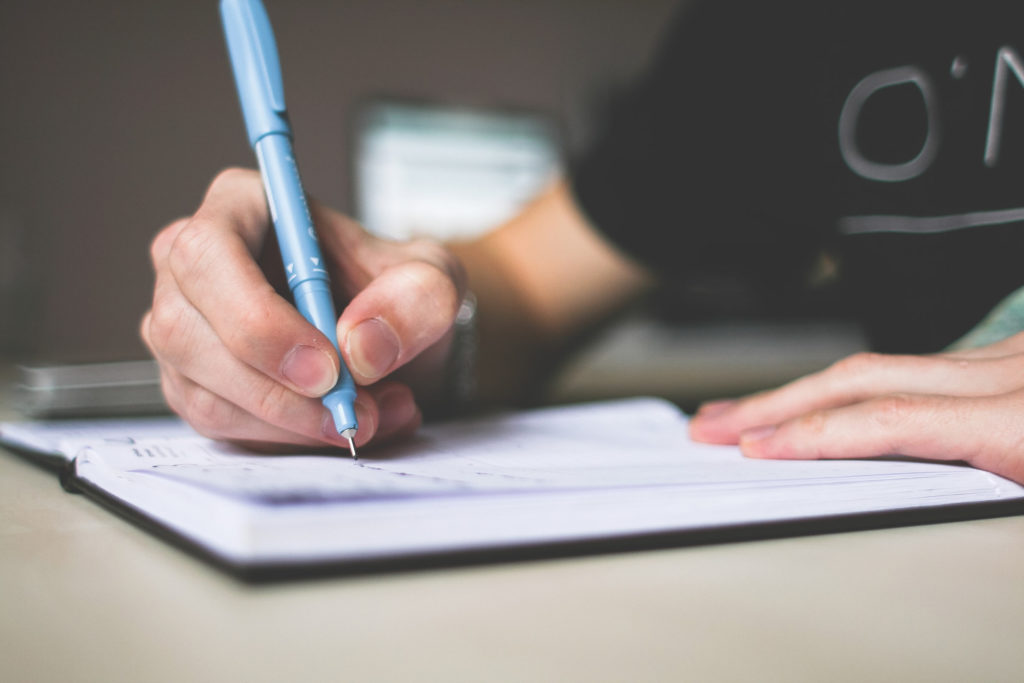 hand writing in a notebook